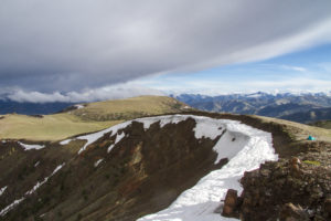 Jerry Peak Wilderness, Boulder White Cloud Mountains - A lone tent weathers a passing summer storm on the summit of Jerry Peak.