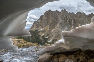 White Cloud Wilderness - Boulder White Cloud Mountains - The granite spires of Serrate Ridge framed from beneath a melting snowfield.